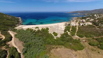 an aerial view of a beach and the ocean at Résidence de Tourisme Mare e Macchia in Tizzano