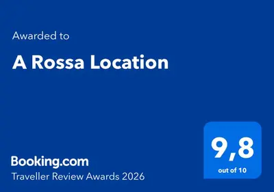 a blue rectangle with the words a rossa location at A Rossa Location in Favone
