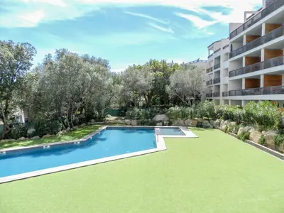 an apartment with a swimming pool in a building at Apartment Résidence Cita di Sali-7 by Interhome in Porto-Vecchio