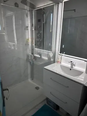 a bathroom with a sink and a shower and a sink at Villa Bella Vista in Porto-Vecchio