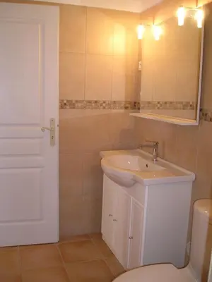 a bathroom with a sink and a toilet at E Stelle di A Bella Vista in Bonifacio