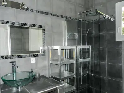 a bathroom with a glass sink and a shower at Holiday Home Cavoni by Interhome in Moriani Plage