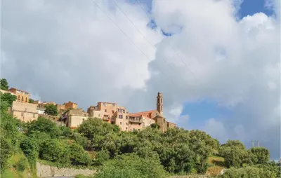 a town on top of a hill with houses at Nice Home In Ville Di Paraso With Wifi in Ville-di-Paraso