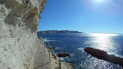 a view of the ocean from a cliff at Villa Louise in Bonifacio