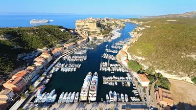 an aerial view of a harbor with boats in the water at Villa Louise in Bonifacio