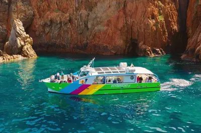 a group of people on a boat in the water at Le Vaita in Porto Ota