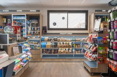 a store aisle of a grocery store at Hôtel Des Nacres in Ventiseri