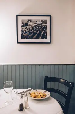 a table with a plate of food on top of it at Chez Marie in Linguizzetta