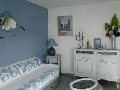 a bedroom with a bed and a dresser and a mirror at CASA Piana in Cervione