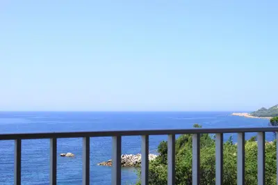 a view of the ocean from a balcony at L'Allegria in Casaglione