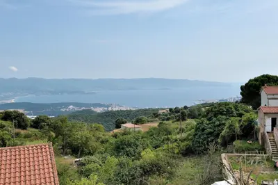 a view of the ocean from a house at Hotel Alata in Alata