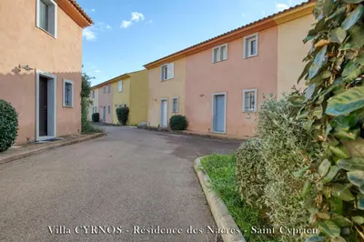 an empty street in front of some buildings at CYRNOS in Porto-Vecchio