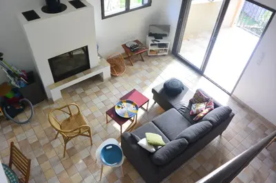 an overhead view of a living room with a couch at FILETTA in Sari Solenzara
