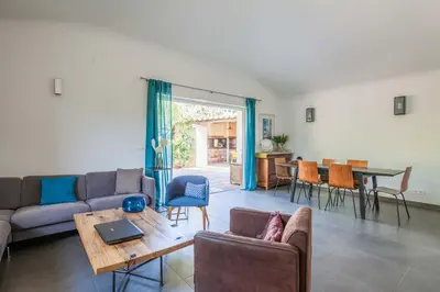 a living room with a couch and a table at la villa piana Ardiadoro in Bocca del Oro