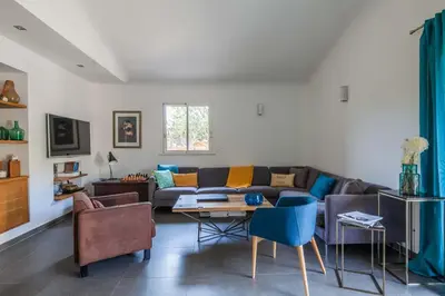 a living room with a couch and a table at la villa piana Ardiadoro in Bocca del Oro