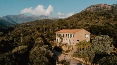 an aerial view of a house on a mountain at L'Aiglon in Serriera