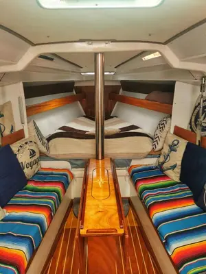 two beds in the back of a boat at seuls à bord dans le golfe hebergement atypique in Porto-Vecchio