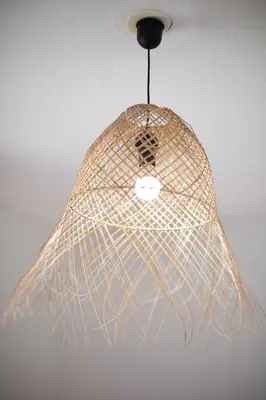 a light fixture hanging from a ceiling at Evasion Marine - T2 Vue mer - Terrasse - Plage à pied in Ajaccio