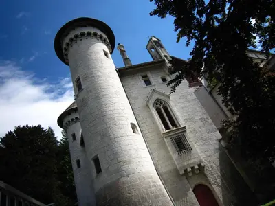 a building with a tower on top of it at Delightful Villa at Moriani-Plage with Garden in San-Nicolao