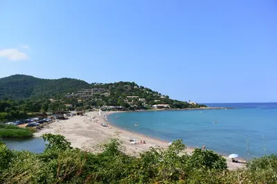 a beach with a bunch of people on it at BIJOU in Conca