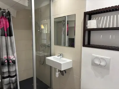 a bathroom with a sink and a shower at ELENA in Conca