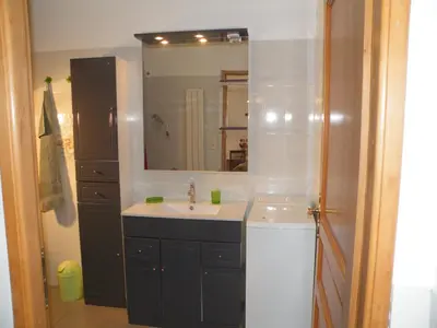 a bathroom with a sink and a mirror at Villa Liamone in Sagone