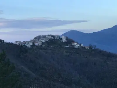 a group of houses on top of a hill at CHAMBRES DHOTES CORSE in Venaco
