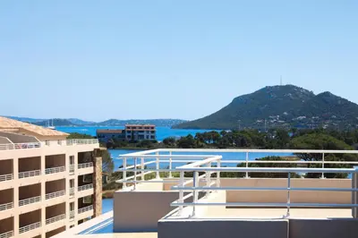 a view from the balcony of a building at Apartment in Corsica near Palombaggia Beach in Porto-Vecchio