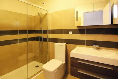 a bathroom with a toilet and a sink and a shower at Residence Salina Bay, Porto Vecchio, Apartment garden side in Porto-Vecchio