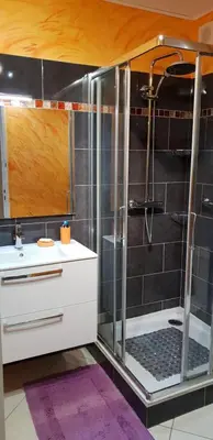 a bathroom with a shower and a sink at dupleix U Forcone in Ajaccio