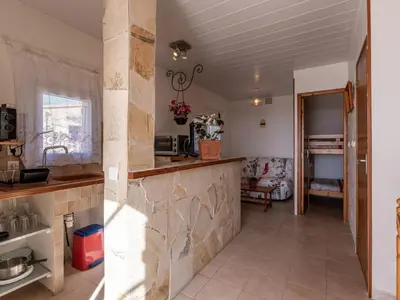 a kitchen with a sink and a counter top at Holiday Home Campestra by Interhome in Coti-Chiavari