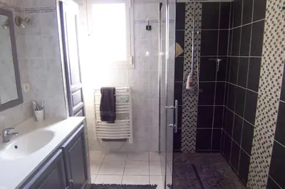 a bathroom with a shower and a sink at CELESTE in Capo