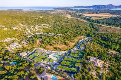 an aerial view of a park with greenhouses at Résidence Pierre & Vacances Premium Les Terrasses d'Arsella in Porto-Vecchio