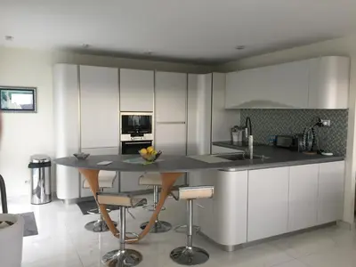 a kitchen with a island in the middle of a room at Barbicaja in Ajaccio