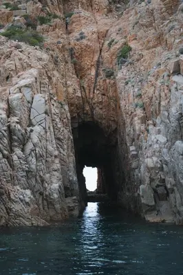 a cave in the side of a rocky cliff at Résidence Idéal-Subrini in Porto Ota