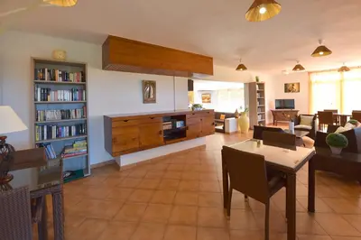 a living room with a couch and a table at Residence Helios in Cargèse