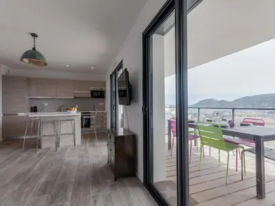 a bathroom with a sink and a mirror at Apartment Château-10 by Interhome in Porto-Vecchio