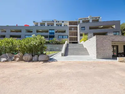 a swimming pool in the backyard of a house at Apartment Bastion-3 by Interhome in Porto-Vecchio