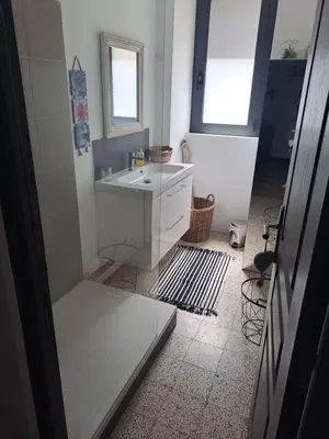 a bathroom with a sink and a mirror at Casa tanghicciola in Levie