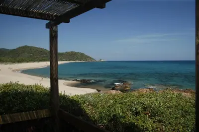 a view of a beach and the ocean at Residence Fium Del Cavo in Sainte-Lucie de Porto-Vecchio