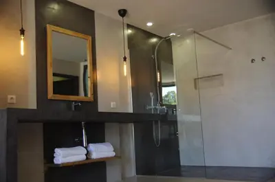 a bathroom with a shower and a sink and a mirror at CASA IB in Peri