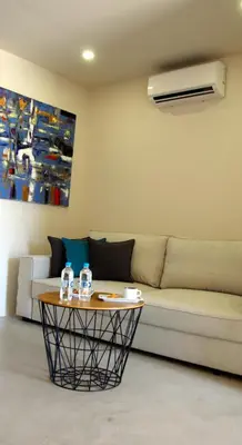 a living room with a couch and a table at CASA IB in Peri