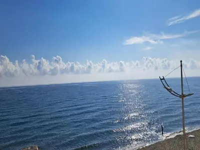 a view of the ocean from the shore of a beach at Holiday Home in Moriani-Plage near Beach in San-Nicolao