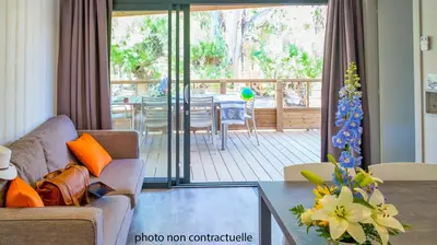 a living room with a couch and a table at U FARNIENTE in Bonifacio