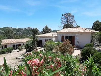 a house with a garden in front of it at SOLE DI DUME in Sotta