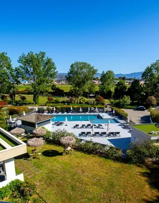 an aerial view of a resort with a swimming pool at Suite Home Porticcio in Porticcio