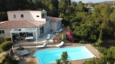 an aerial view of a house with a swimming pool at A BARMETTA in Porto-Vecchio
