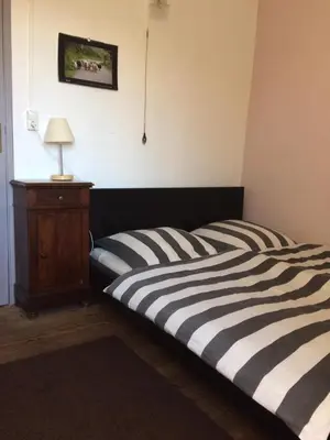 two beds sitting next to each other in a room at Casa Franceschi in Pioggiola