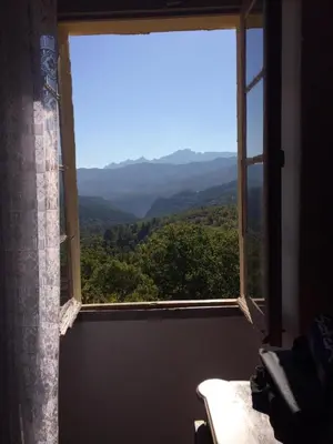 a window with a view of a mountain view at Casa Franceschi in Pioggiola