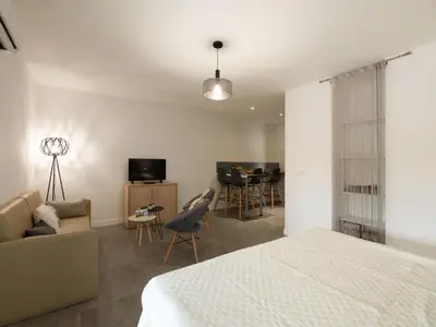a swimming pool in front of a building at Apartment Bastion-2 by Interhome in Porto-Vecchio